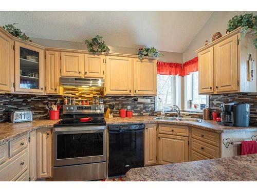 5716 28 Street, Lloydminster, AB - Indoor Photo Showing Kitchen With Double Sink