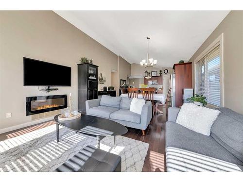 8-1408 52B Avenue, Lloydminster, AB - Indoor Photo Showing Living Room With Fireplace