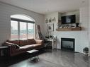 818 29 Street, Wainwright, AB  - Indoor Photo Showing Living Room With Fireplace 