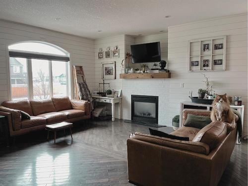 818 29 Street, Wainwright, AB - Indoor Photo Showing Living Room With Fireplace