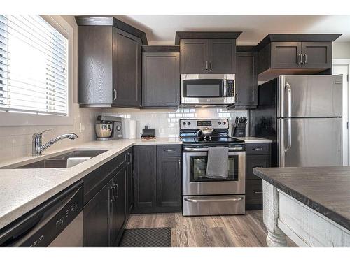 1-3390 72 Avenue, Lloydminster, AB - Indoor Photo Showing Kitchen With Double Sink