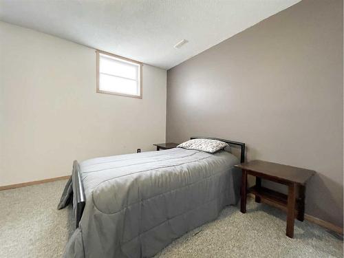 1107 2 Avenue, Wainwright, AB - Indoor Photo Showing Bedroom