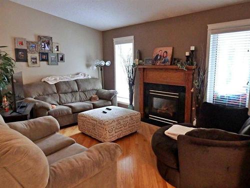 65074 Twn 494 Township, Rural Vermilion River, County Of, AB - Indoor Photo Showing Living Room With Fireplace