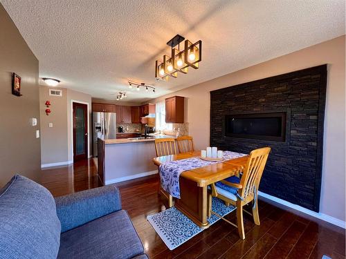 910 29 Street, Wainwright, AB - Indoor With Fireplace