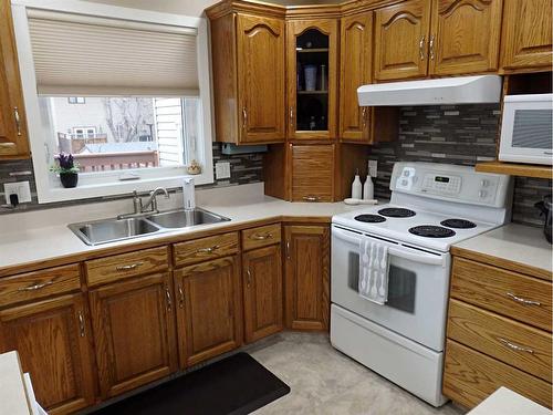 6008 51 Avenue, Vermilion, AB - Indoor Photo Showing Kitchen With Double Sink