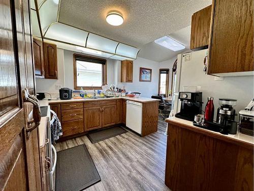 1108 18A Street Crescent, Wainwright, AB - Indoor Photo Showing Kitchen With Double Sink