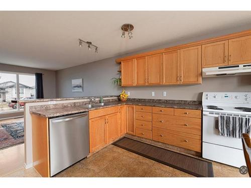 4420 26 Street, Lloydminster, AB - Indoor Photo Showing Kitchen With Double Sink