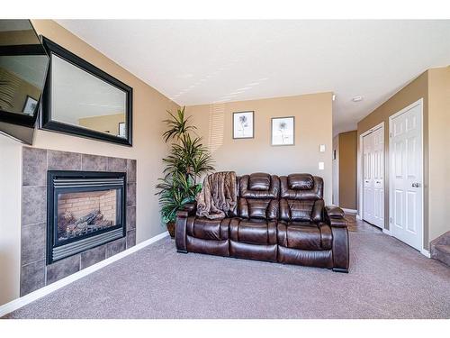 3907 70 Avenue, Lloydminster, AB - Indoor Photo Showing Living Room With Fireplace