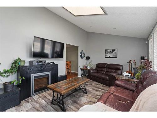 3103 58 Avenue, Lloydminster, AB - Indoor Photo Showing Living Room With Fireplace