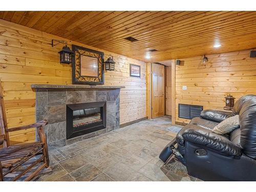 5210 48 Avenue, Kitscoty, AB - Indoor Photo Showing Living Room With Fireplace