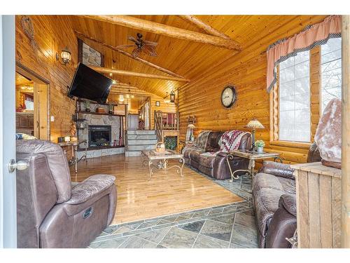 5210 48 Avenue, Kitscoty, AB - Indoor Photo Showing Living Room With Fireplace