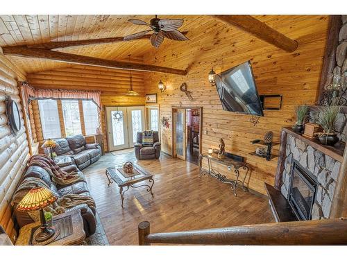 5210 48 Avenue, Kitscoty, AB - Indoor Photo Showing Living Room With Fireplace