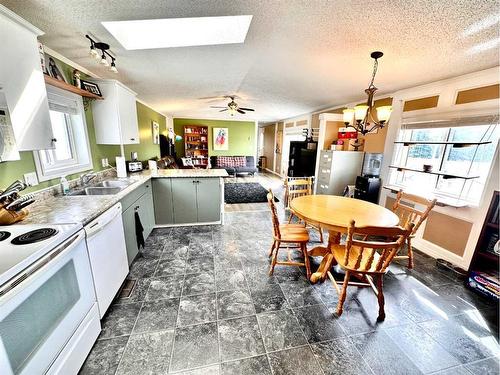 1801 2A Street Crescent, Wainwright, AB - Indoor Photo Showing Kitchen With Double Sink
