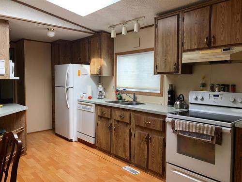 308 8 Avenue, Paradise Hill, SK - Indoor Photo Showing Kitchen With Double Sink