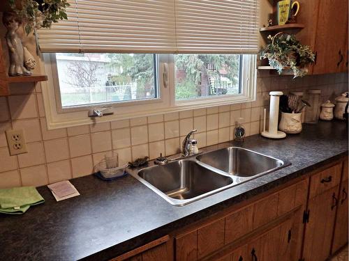 4809 Riverside Drive, Vermilion, AB - Indoor Photo Showing Kitchen With Double Sink