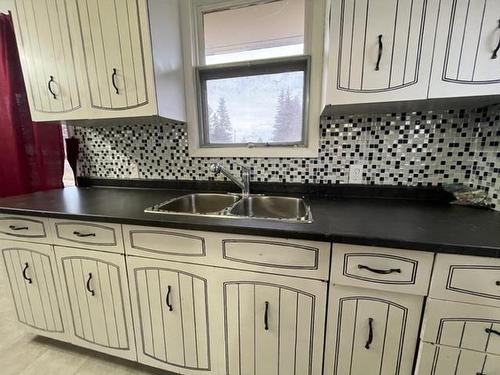 301 3 Street North, Marwayne, AB - Indoor Photo Showing Kitchen With Double Sink