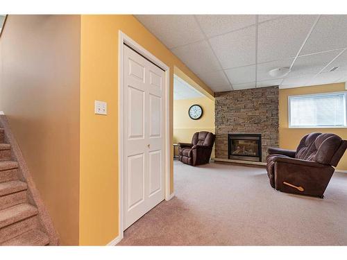 5906 41 Street, Lloydminster, AB - Indoor Photo Showing Other Room With Fireplace