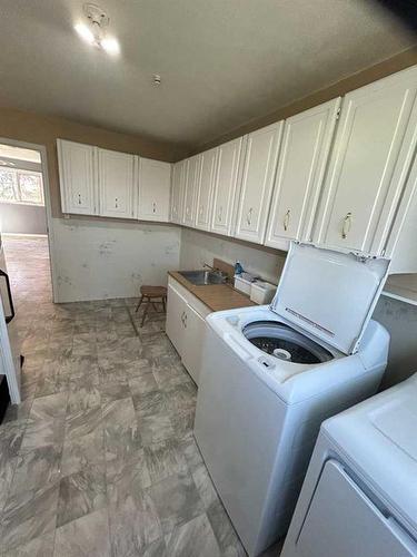 4502 50 Street, Myrnam, AB - Indoor Photo Showing Laundry Room