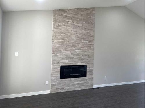 1102 9 Avenue, Wainwright, AB - Indoor With Fireplace