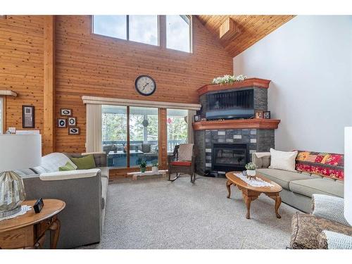 102 Kildaw Drive, Loon Lake, SK - Indoor Photo Showing Living Room With Fireplace