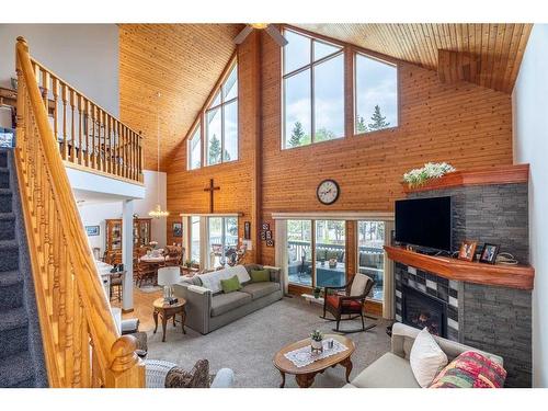 102 Kildaw Drive, Loon Lake, SK - Indoor Photo Showing Living Room With Fireplace