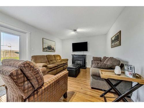 2702 58 Avenue, Lloydminster, AB - Indoor Photo Showing Living Room With Fireplace