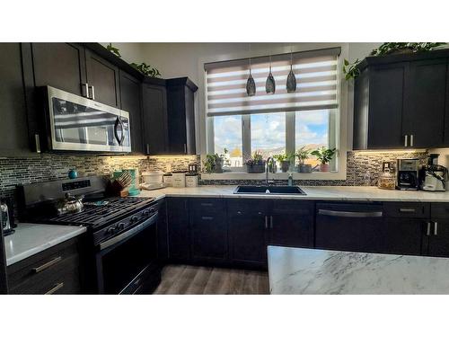 2441 7 Avenue, Wainwright, AB - Indoor Photo Showing Kitchen With Double Sink