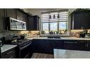 2441 7 Avenue, Wainwright, AB  - Indoor Photo Showing Kitchen With Double Sink 