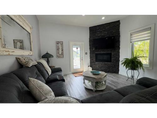 2441 7 Avenue, Wainwright, AB - Indoor Photo Showing Living Room With Fireplace