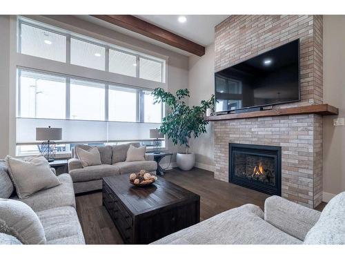 6119 13 Street Close, Lloydminster, AB - Indoor Photo Showing Living Room With Fireplace