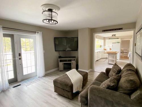 8 Cloverview Crescent, Rural Vermilion River, County Of, AB - Indoor Photo Showing Living Room With Fireplace