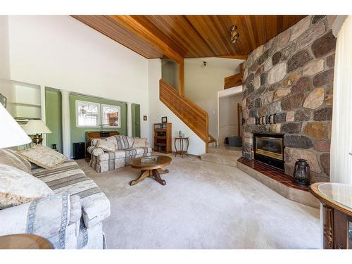 5213 47 Street, Lloydminster, AB - Indoor Photo Showing Living Room With Fireplace