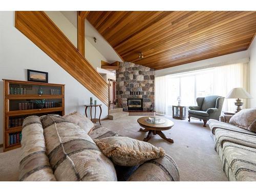 5213 47 Street, Lloydminster, AB - Indoor Photo Showing Living Room With Fireplace