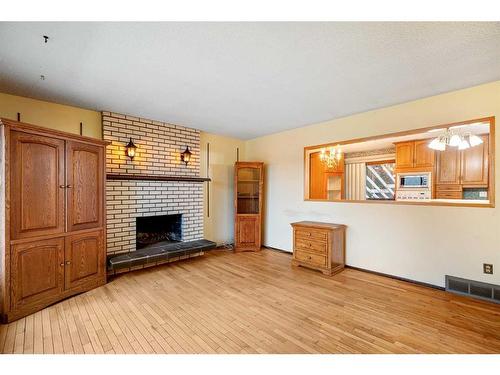 4812 40 Street, Lloydminster, SK - Indoor Photo Showing Living Room With Fireplace