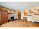 4812 40 Street, Lloydminster, SK  - Indoor Photo Showing Living Room With Fireplace 