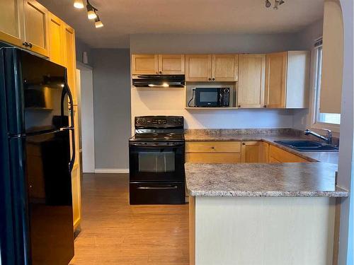 5339 52 Street, Provost, AB - Indoor Photo Showing Kitchen With Double Sink