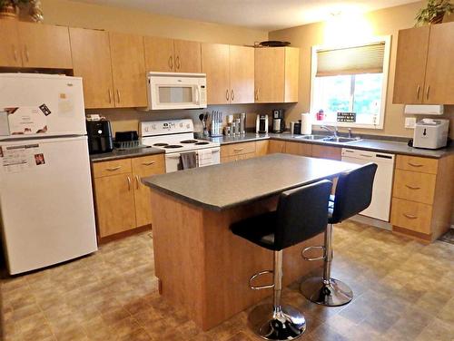 105-4520 51 Street, Vermilion, AB - Indoor Photo Showing Kitchen With Double Sink