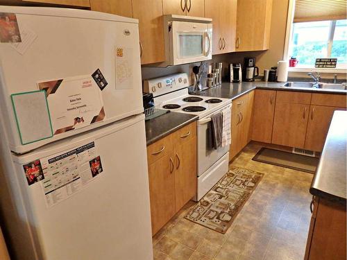 105-4520 51 Street, Vermilion, AB - Indoor Photo Showing Kitchen With Double Sink