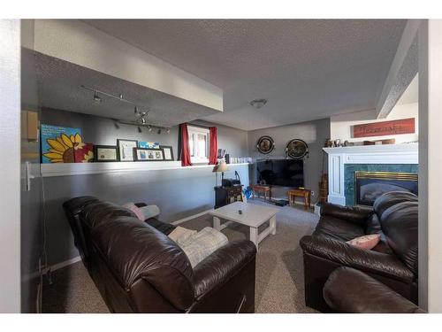 87 3 Street, Lashburn, SK - Indoor With Fireplace