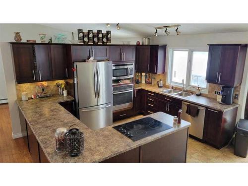 412 1 Street, Paradise Hill, SK - Indoor Photo Showing Kitchen With Stainless Steel Kitchen With Double Sink