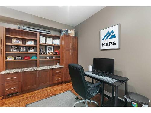 1605 53A Avenue Close, Lloydminster, AB - Indoor Photo Showing Living Room With Fireplace