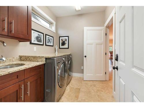 1605 53A Avenue Close, Lloydminster, AB - Indoor Photo Showing Living Room With Fireplace