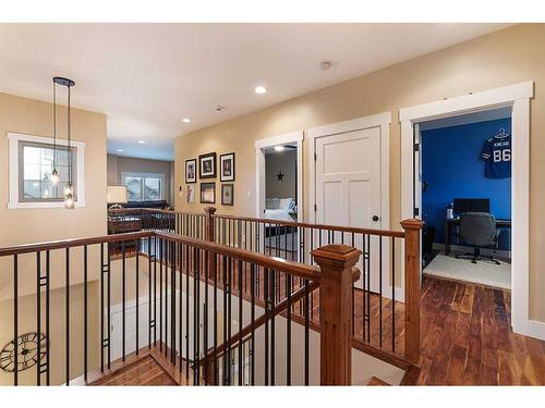 1605 53A Avenue Close, Lloydminster, AB - Indoor Photo Showing Living Room With Fireplace