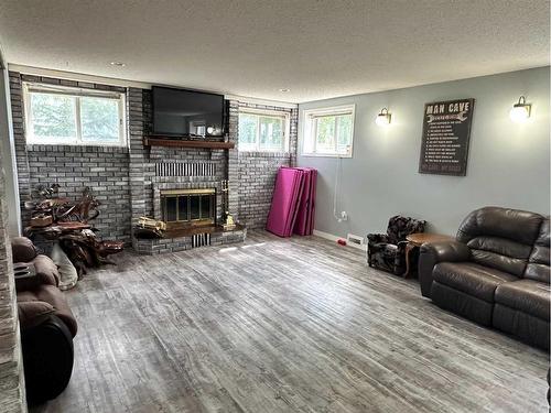 15 Hawkes Street, Marsden, SK - Indoor Photo Showing Living Room With Fireplace