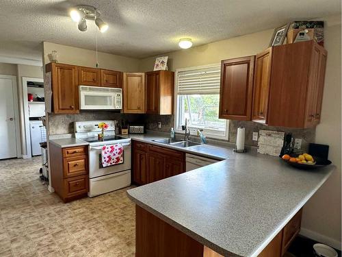 15 Hawkes Street, Marsden, SK - Indoor Photo Showing Kitchen With Double Sink