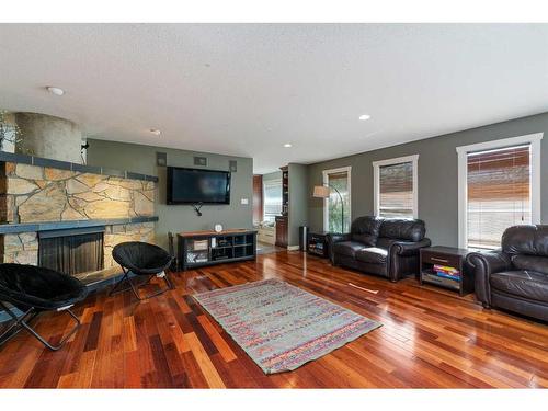 3706 56A Avenue, Lloydminster, AB - Indoor Photo Showing Living Room With Fireplace