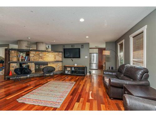 3706 56A Avenue, Lloydminster, AB - Indoor Photo Showing Living Room With Fireplace