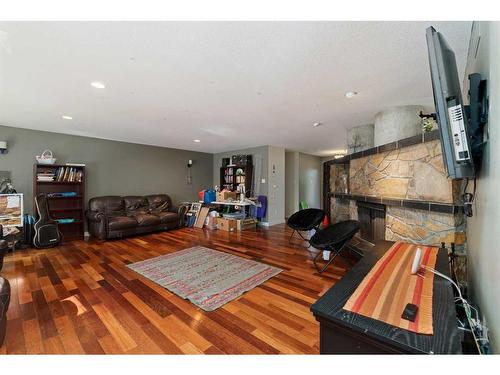 3706 56A Avenue, Lloydminster, AB - Indoor Photo Showing Living Room With Fireplace