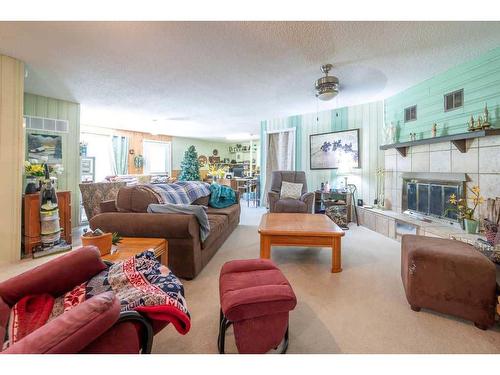 22 Hawkes Street, Marsden, SK - Indoor Photo Showing Living Room With Fireplace