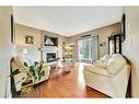 1620 53A Avenue Close, Lloydminster, AB  - Indoor Photo Showing Living Room With Fireplace 